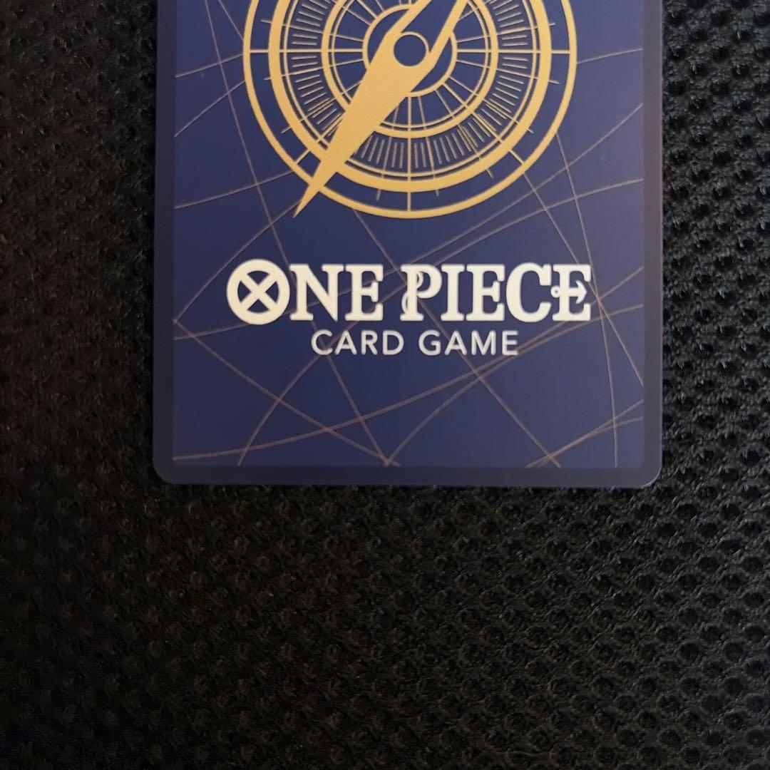 One Piece Monkey D. Luffy SEC Parallel OP05-119 trading card with sleeve and hard case