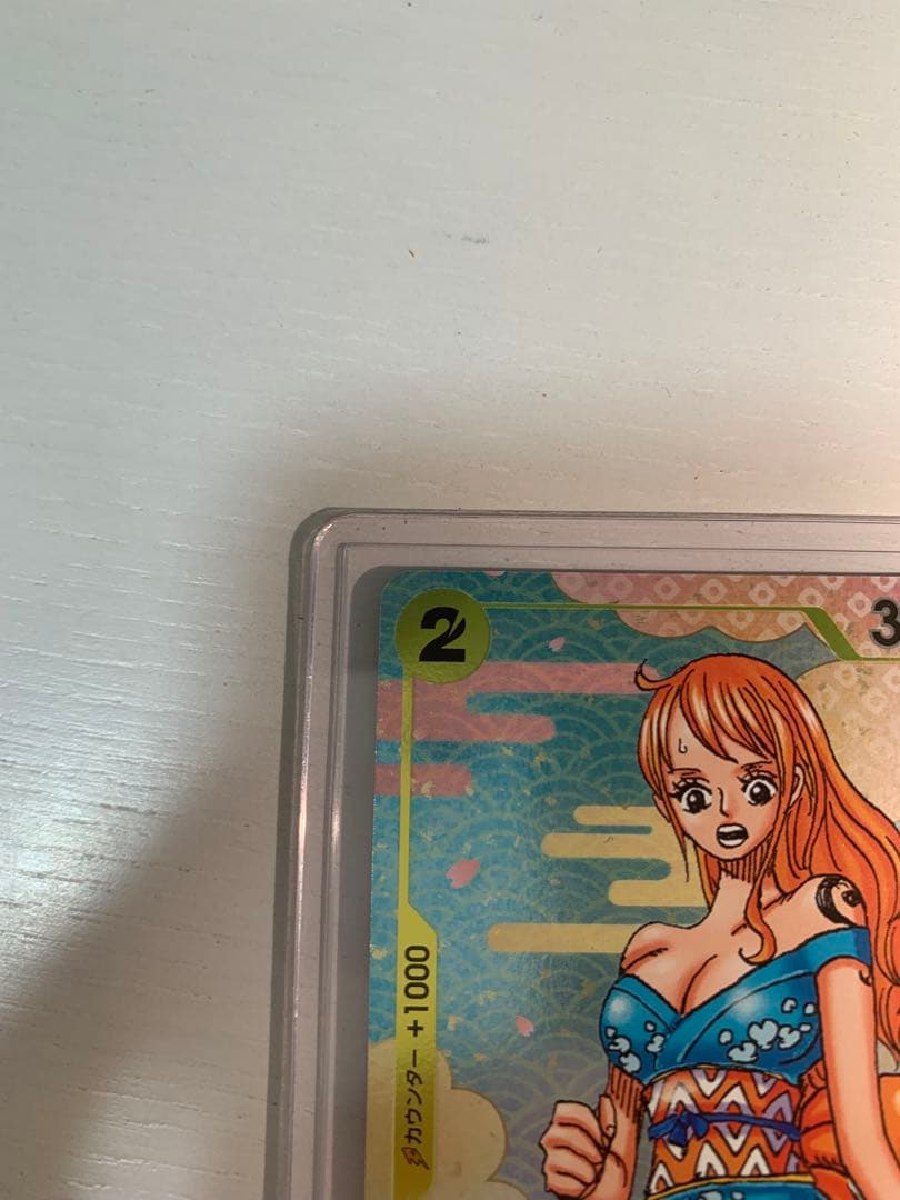One Piece Card Game Nami OP08-101 character card with vanish and KO abilities, cost 2, power 3000