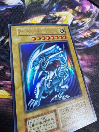 Yugioh Blue Eyes White Dragon Initial Ultra Rare Japanese trading card with slight scratches