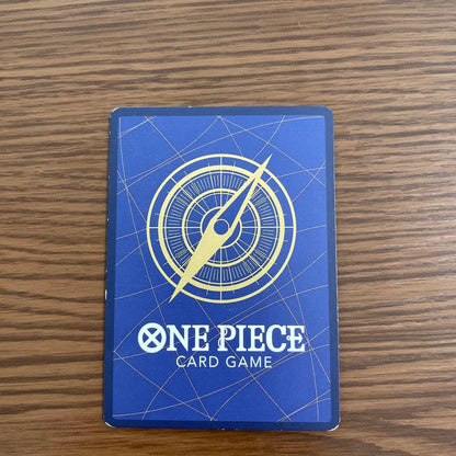 One Piece Monkey D Luffy character card OP043 with attack power 7000 featuring slight handling signs and a small crease
