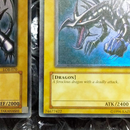 Red Eyes Misprint Error Double Error Card LOB-070 with faded foil shift and white shadow under Red Eyes