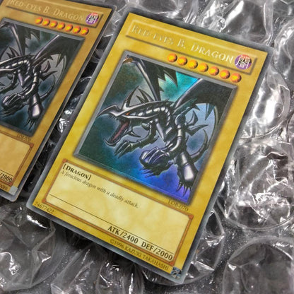 Red Eyes Misprint Error Double Error Card LOB-070 with faded foil shift and white shadow under Red Eyes