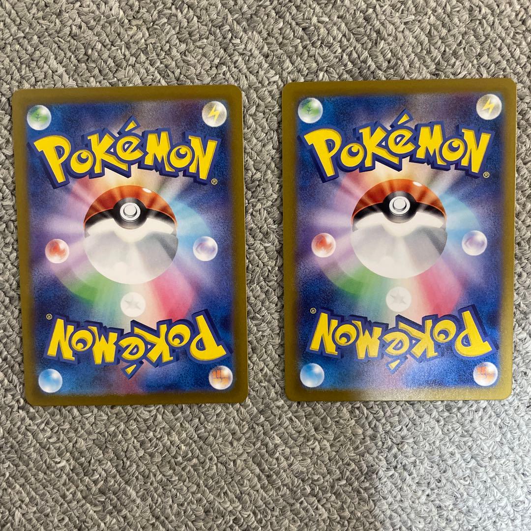 Pokemon Iris Series SR Error Card Set of Two featuring rare print misalignment error card and regular card in sleeves