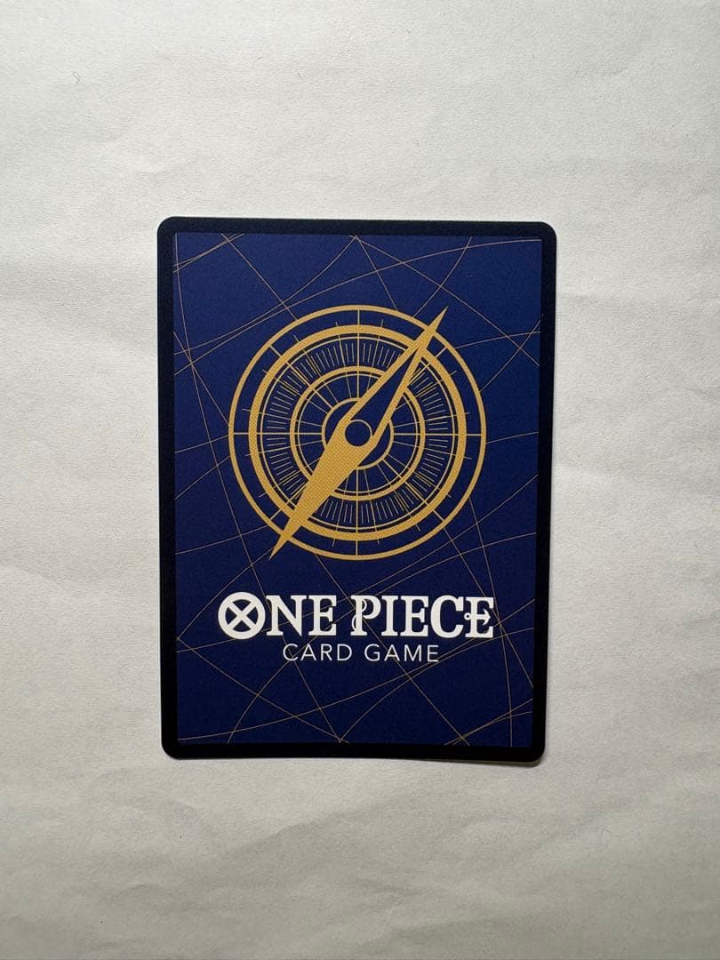 One Piece Card Game Nami R card opened and stored in protective sleeve with bubble-wrapped envelope packaging