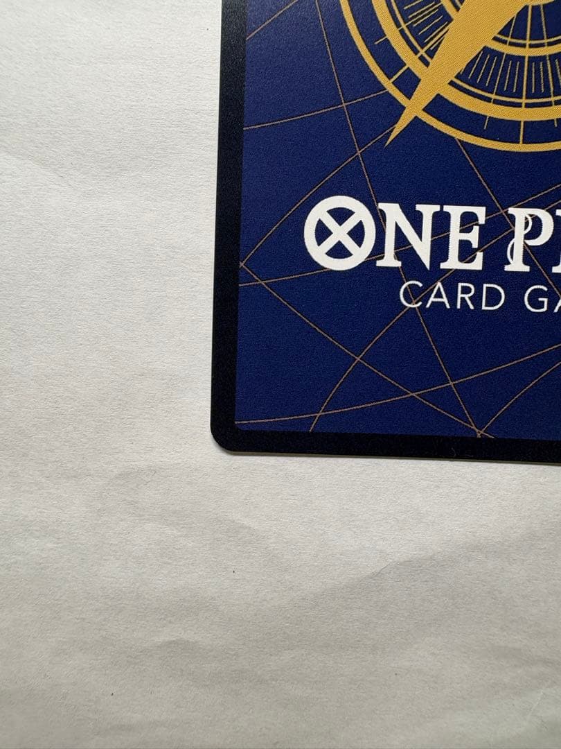 One Piece Card Game Nami R card opened and stored in protective sleeve with bubble-wrapped envelope packaging