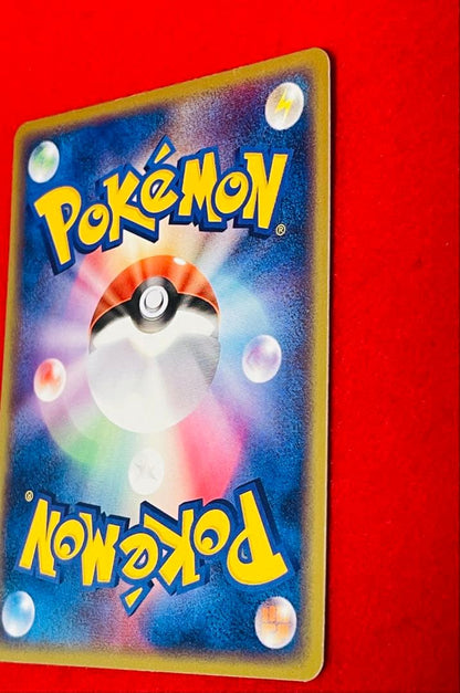 2003 Seven Eleven limited Flygon 032/ADV-P promotional Pokémon card in sleeve with side-loader and bag