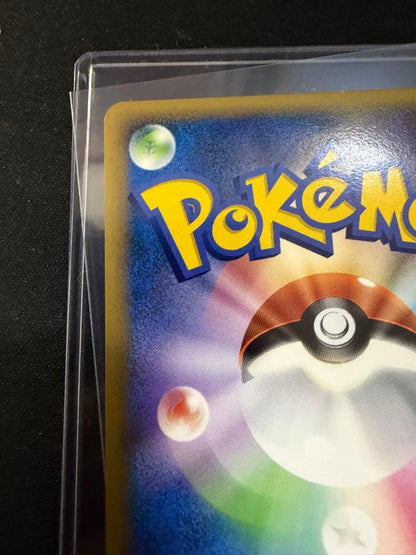 Victory Medal Promo 2006 featuring Pikachu character, stored in protective sleeve for Japan import