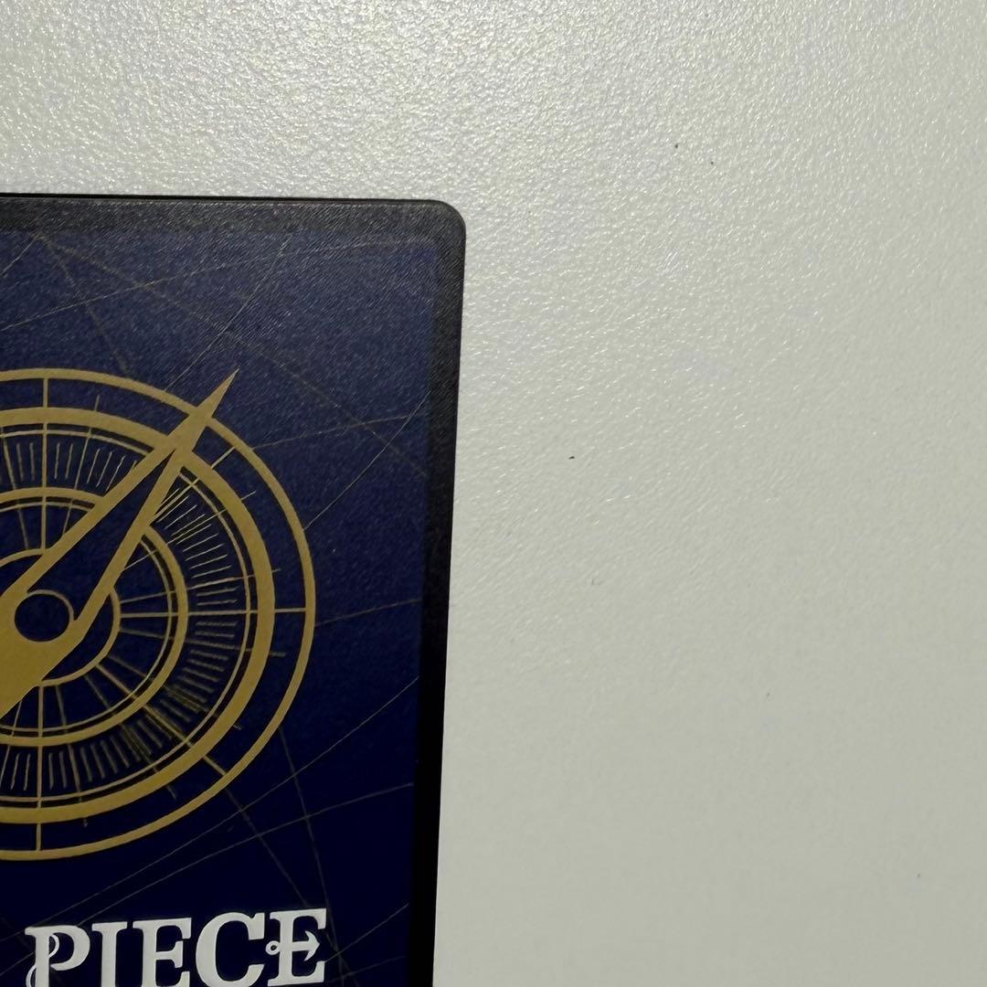 One Piece Card Game Energy Parallel OP15-118 character card with 8000 power and special attribute in protective sleeve