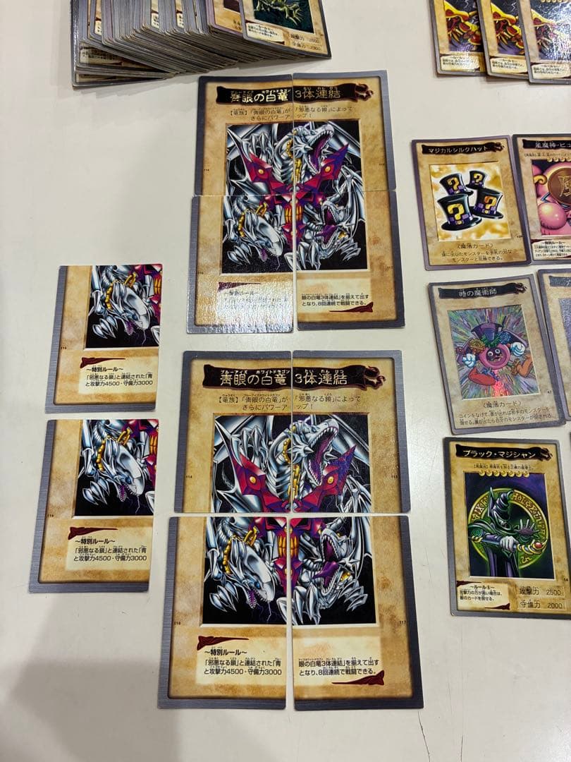 Bandai Yu-Gi-Oh Carddass collection of 169 vintage cards displayed in a fan layout