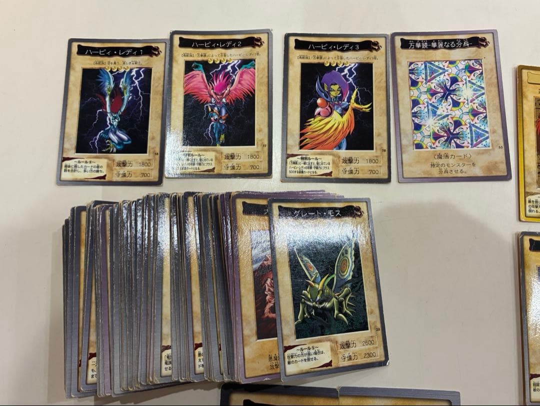 Bandai Yu-Gi-Oh Carddass collection of 169 vintage cards displayed in a fan layout