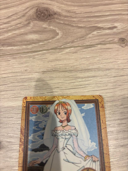 Bandai One Piece trading card showing Nami as Unwanted Bride in a wedding dress with Wisdom attribute