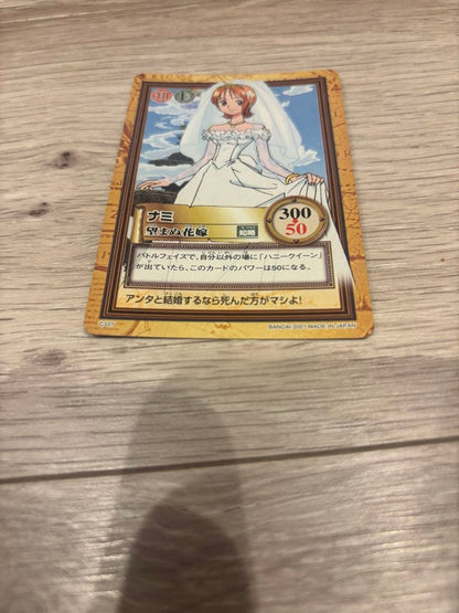 Bandai One Piece trading card showing Nami as Unwanted Bride in a wedding dress with Wisdom attribute