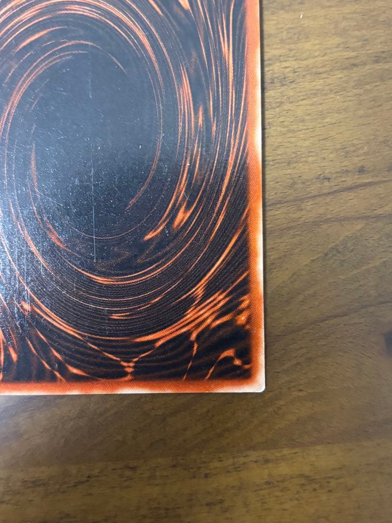 Osiris Sky Dragon God Card G4-01 with visible corner scratches stored in protective sleeve