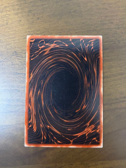 Osiris Sky Dragon God Card G4-01 with visible corner scratches stored in protective sleeve