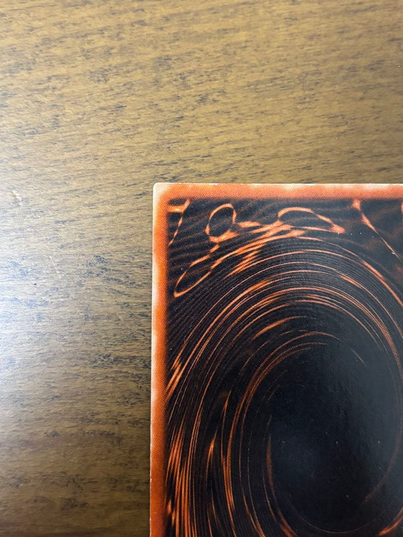 Osiris Sky Dragon God Card G4-01 with visible corner scratches stored in protective sleeve