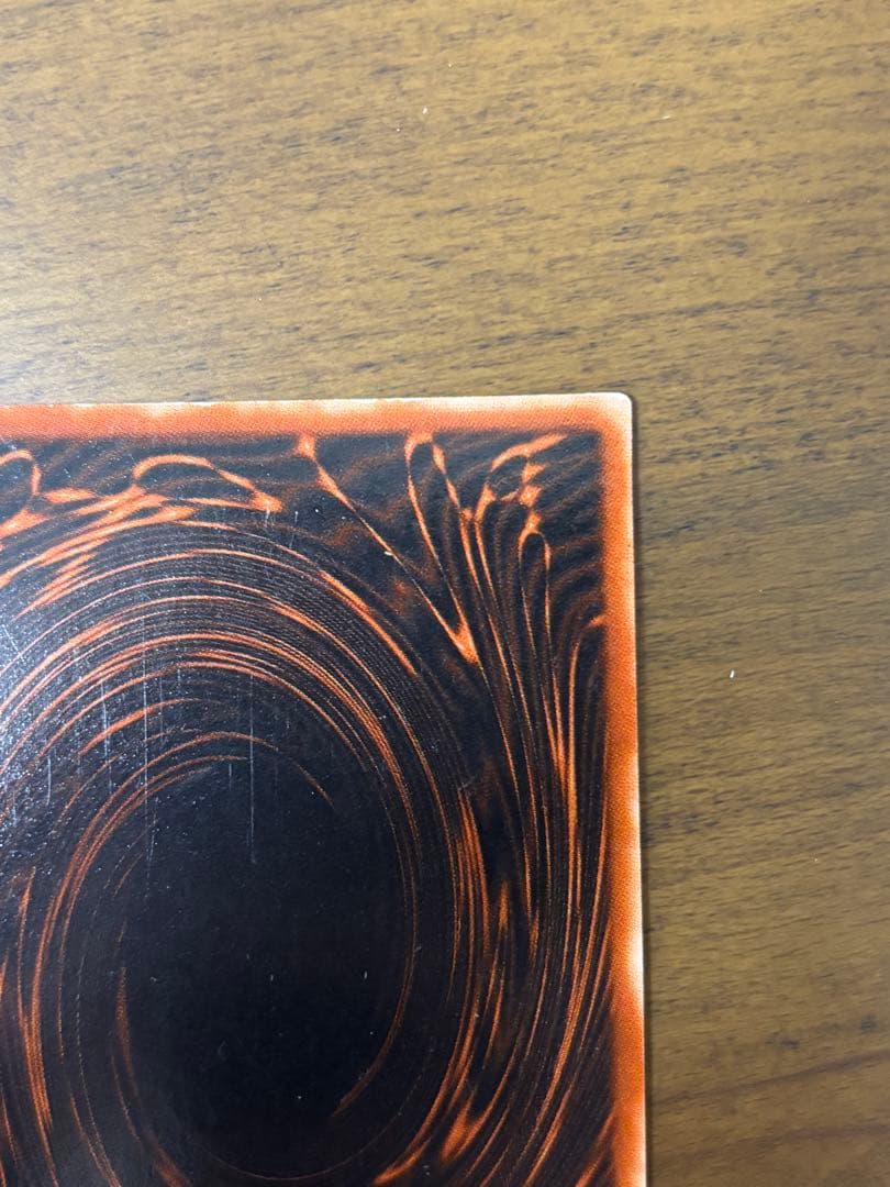 Osiris Sky Dragon God Card G4-01 with visible corner scratches stored in protective sleeve