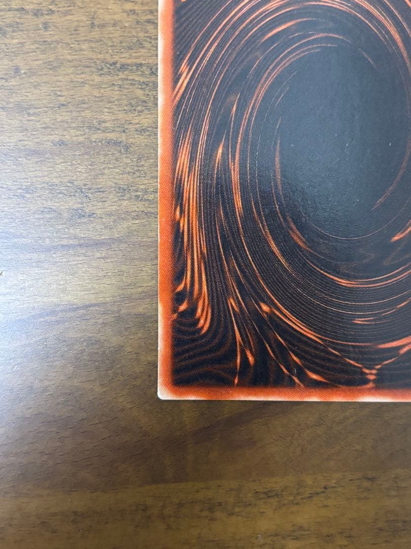 Osiris Sky Dragon God Card G4-01 with visible corner scratches stored in protective sleeve