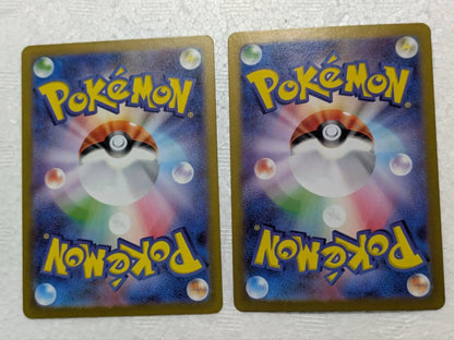 Pokemon promotional Pikachu and Nanjiamo Taiko Electric AR Card set kept in sleeves and loaders