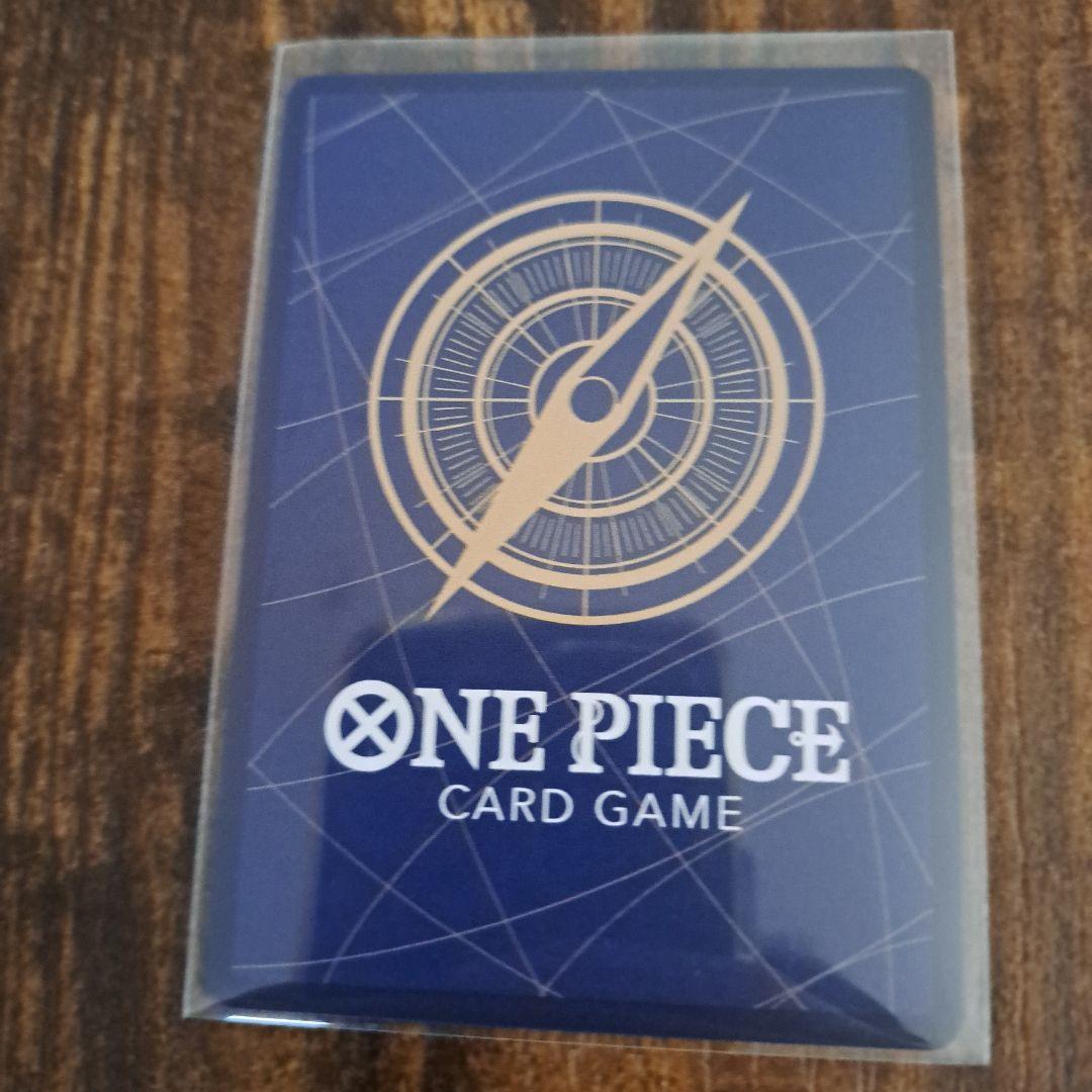One Piece Marshall D. Teach OP16-119 Secret Card in protective sleeve and magnetic loader