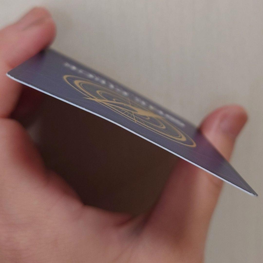 Bandai Monkey D. Luffy P-033 promo card from Japan stored in a card case with visible slight corner bends