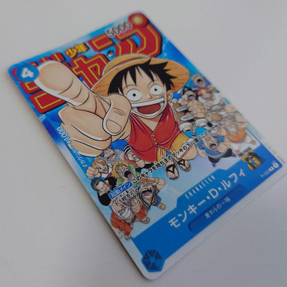 Bandai Monkey D. Luffy P-033 promo card from Japan stored in a card case with visible slight corner bends