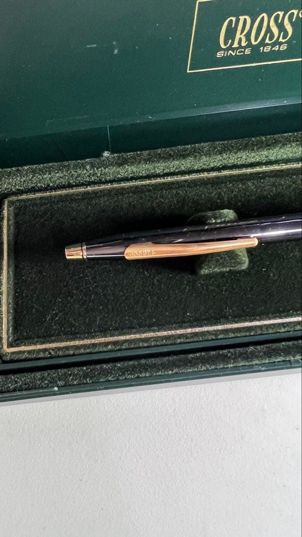 Cross Century twist ballpoint pen in matte black and gold with sleek design