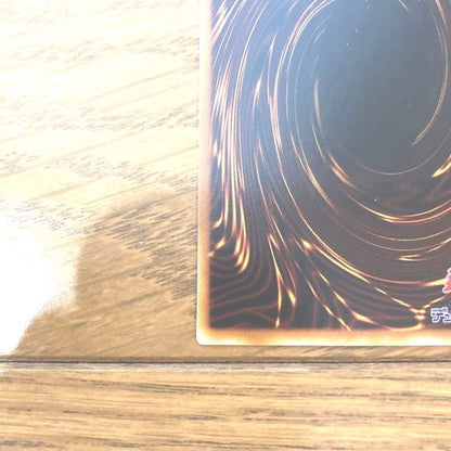 Yu-Gi-Oh! Obelisk the Tormentor Ultra Rare Japanese card showing warping and small scratches