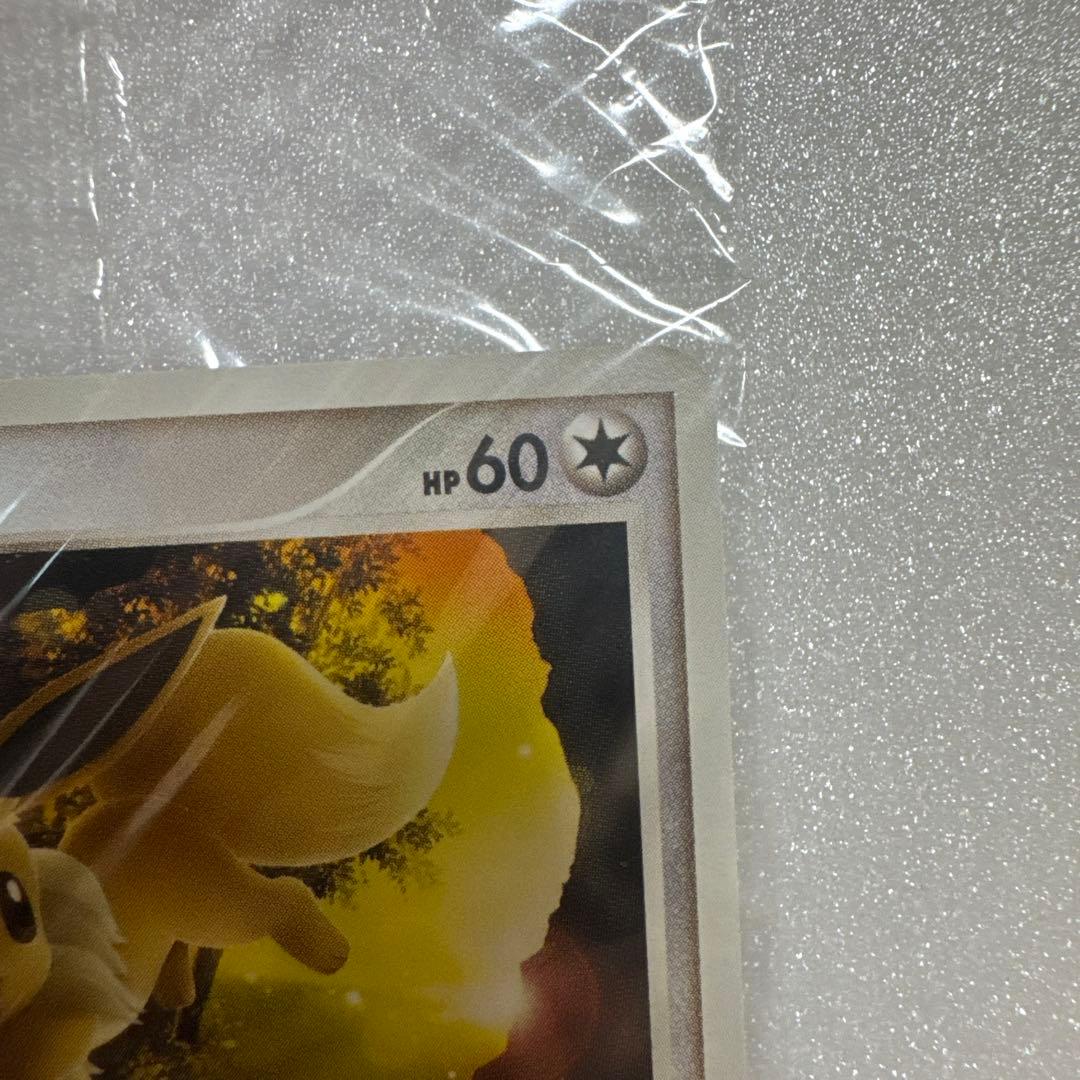 Bandai Eievui Promo Card 067/DP-P in original sleeve with visible age and dirt on packaging