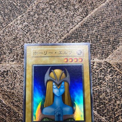 Yugioh Holy Elf Initial ③ card in used vintage condition from Japan import shown diagonally