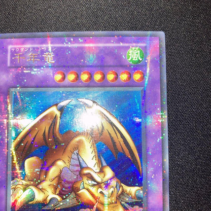 Konami Yu-Gi-Oh Thousand Dragon Ultra Parallel Rare trading card from 20th and 15th Collections