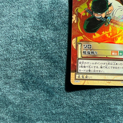 One Piece Card Das Hyber Battle Zoro C401 Yaki Oni Giri with visible damage and water exposure
