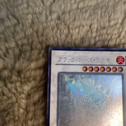 Yugioh Black Rose Dragon holographic rare monster card near mint condition stored in sleeve from Japan import