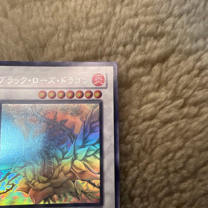 Yugioh Black Rose Dragon holographic rare monster card near mint condition stored in sleeve from Japan import