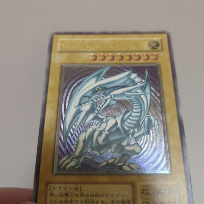 Blue-Eyes White Dragon SM-51 Relief Yu-Gi-Oh card with 3000 attack and 2500 defense, Japan import