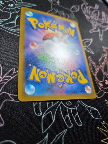 Bandai Megarizard Xex MA card from Mega Dreamex high class pack with visible missing corner and faint scratches