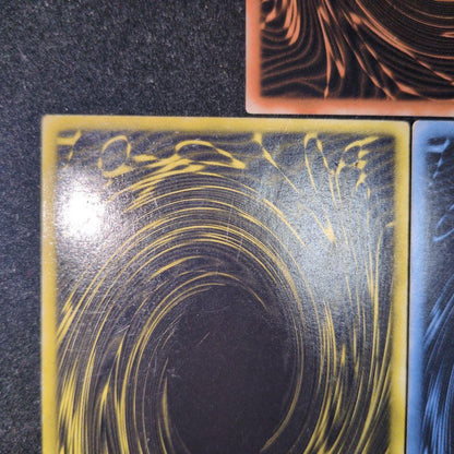 Bandai Yu-Gi-Oh GBI Secret Rare trading cards set featuring Osiris The Sky Dragon, Obelisk The Giant God Soldier, and Ra Winged Dragon of Ra