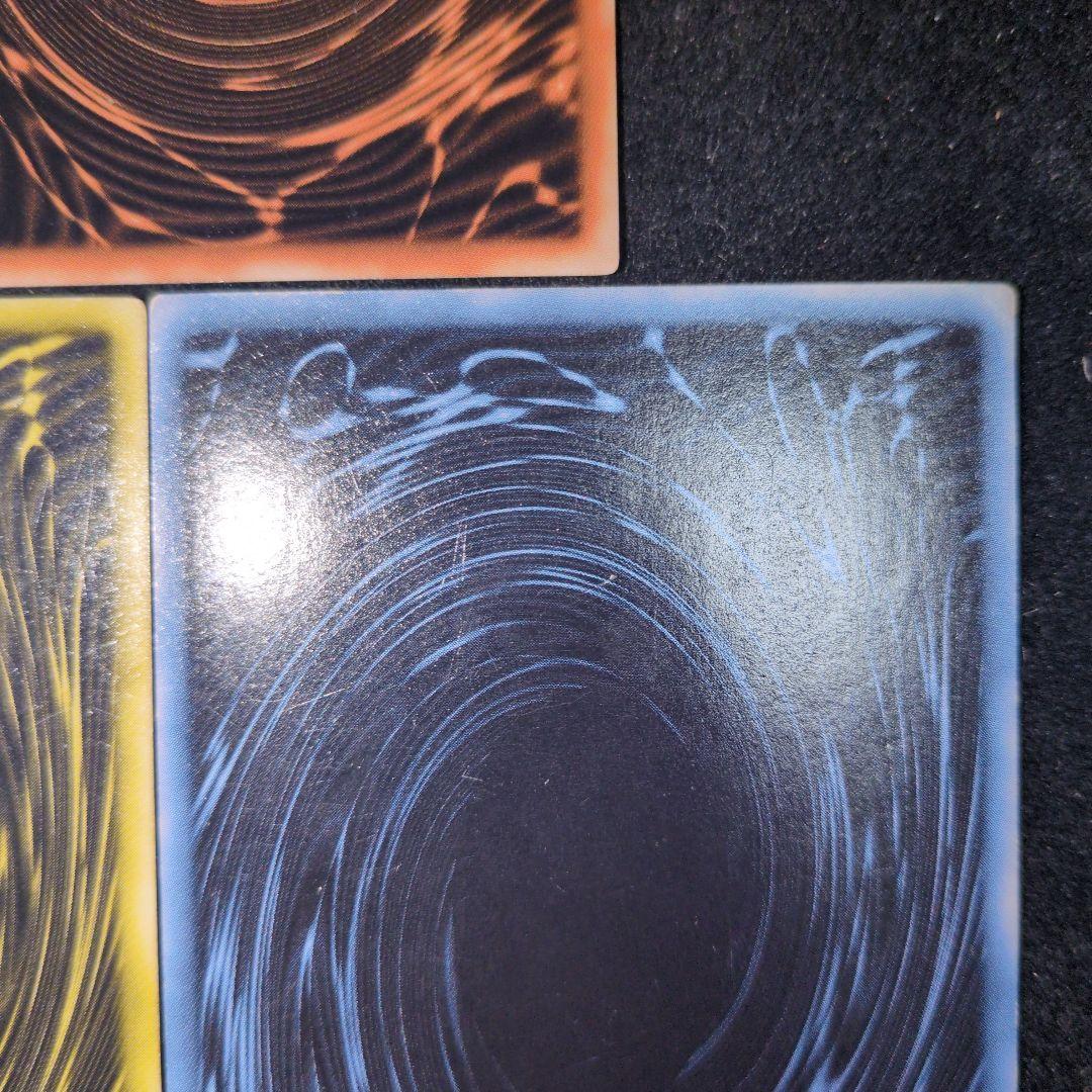 Bandai Yu-Gi-Oh GBI Secret Rare trading cards set featuring Osiris The Sky Dragon, Obelisk The Giant God Soldier, and Ra Winged Dragon of Ra