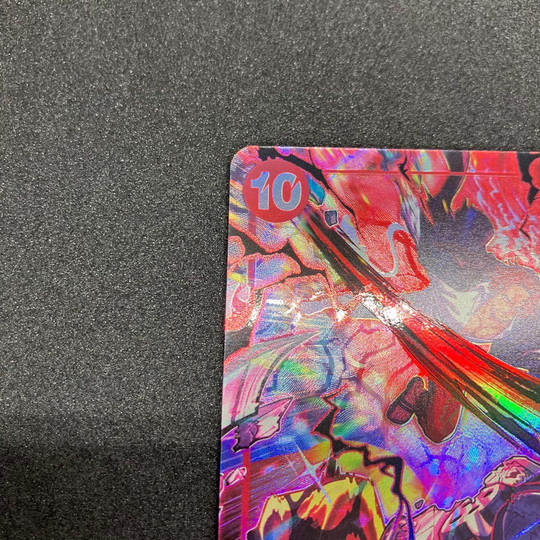 Shanks One Piece card OP09-004 from Second Anniversary set Japanese import with protective sleeve packaging