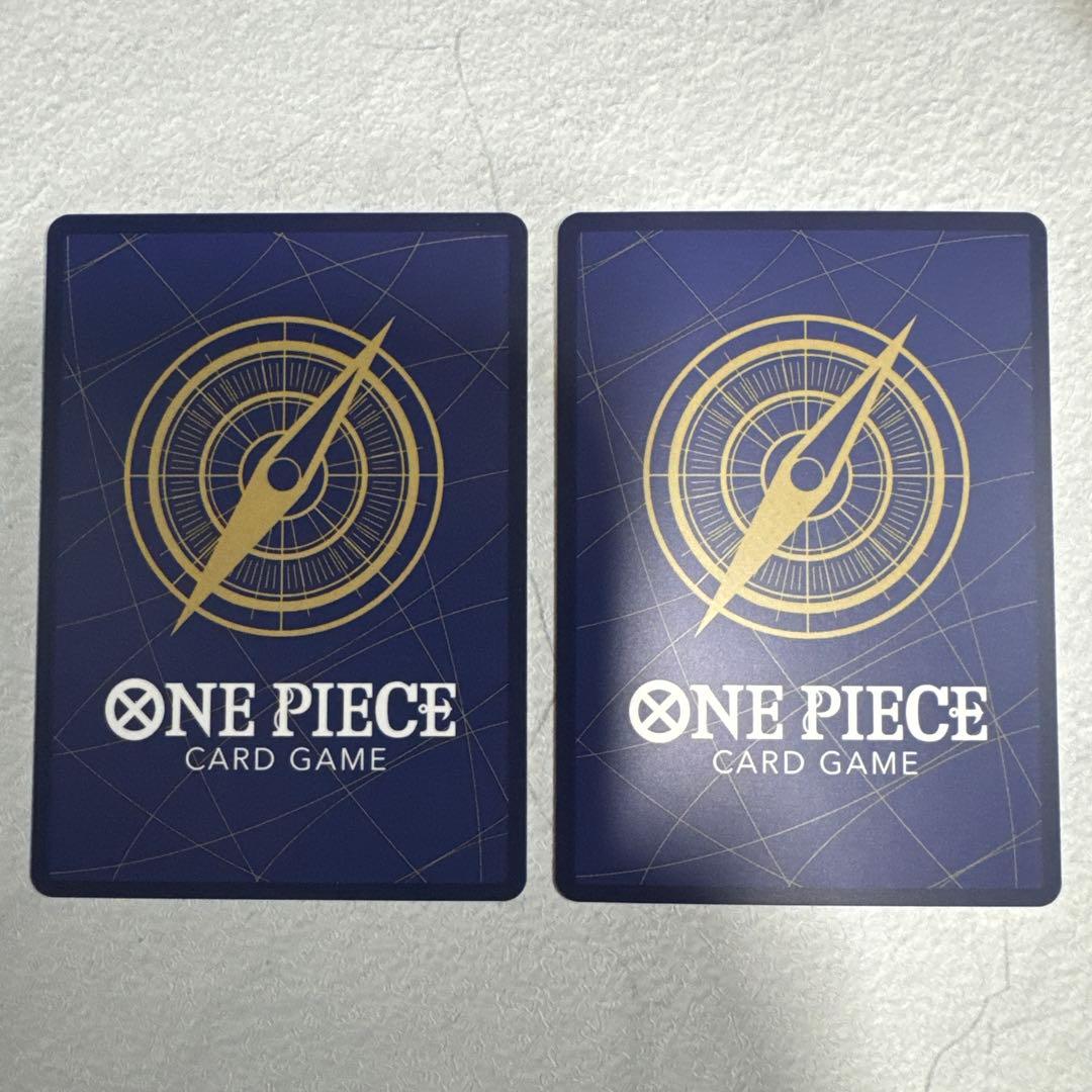 One Piece Card Game Set featuring two Monkey D. Luffy cards in protective sleeves
