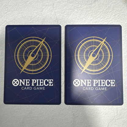 One Piece Card Game Set featuring two Monkey D. Luffy cards in protective sleeves
