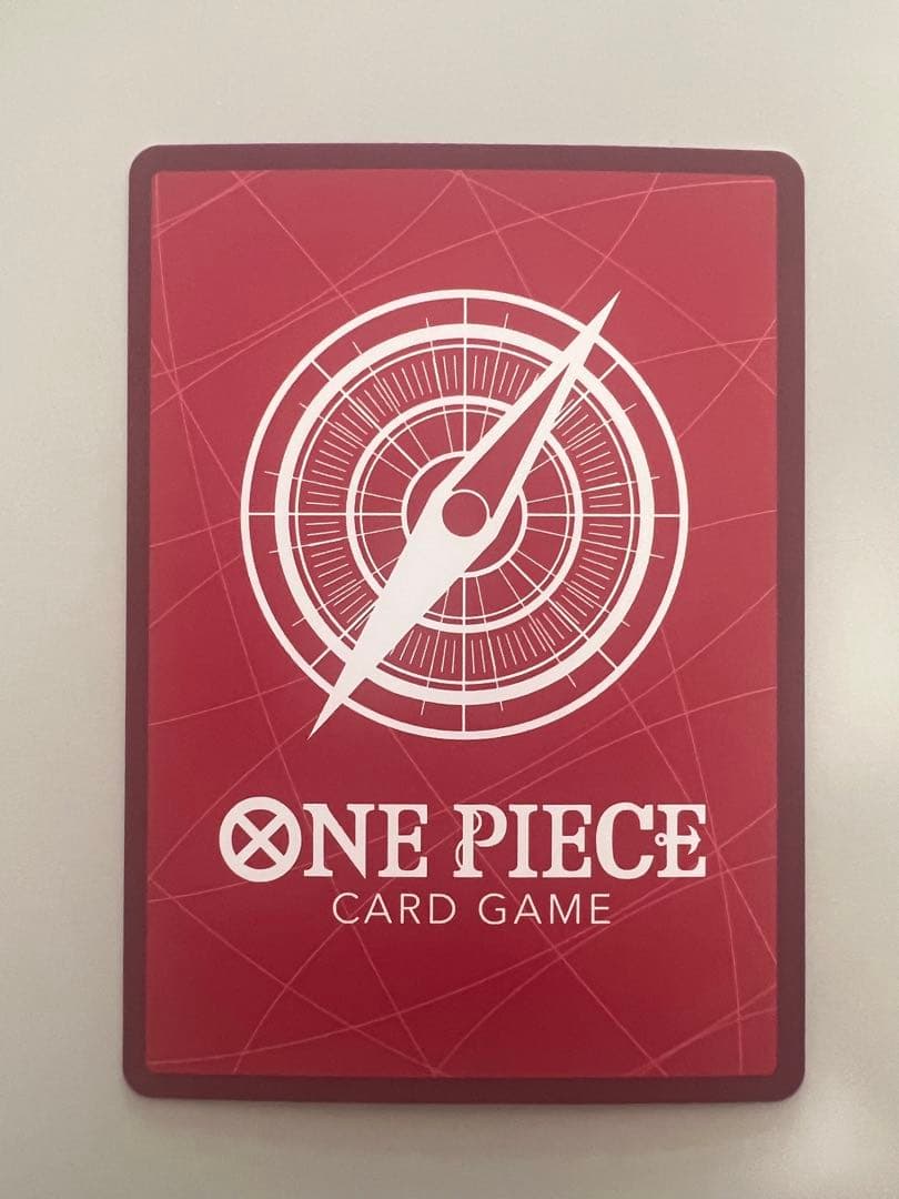 One Piece Luffy & Ace Leader Card from the card game, shown in a protective loader with rain protection