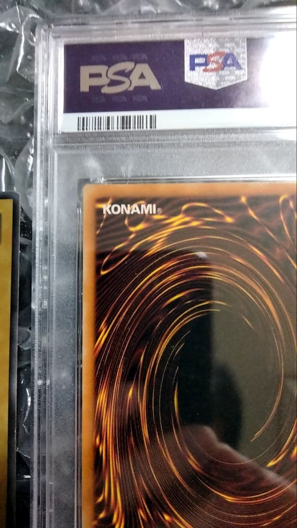 Bandai Yu-Gi-Oh Dark Magician LOB Error Faded Foil Shift PSA 9 single card with faded yellow color