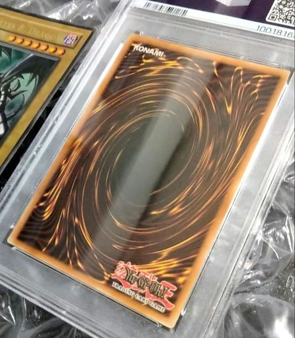 Bandai Yu-Gi-Oh Dark Magician LOB Error Faded Foil Shift PSA 9 single card with faded yellow color
