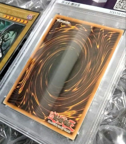 Bandai Yu-Gi-Oh Dark Magician LOB Error Faded Foil Shift PSA 9 single card with faded yellow color
