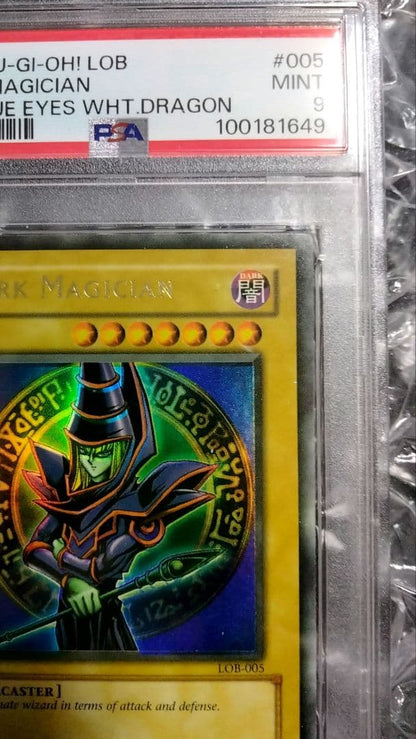 Bandai Yu-Gi-Oh Dark Magician LOB Error Faded Foil Shift PSA 9 single card with faded yellow color
