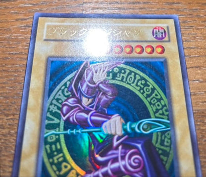 Yugioh Black Magician LB-05 Ultra Rare 2nd Edition Japanese collectible card with visible scratches and scuffs
