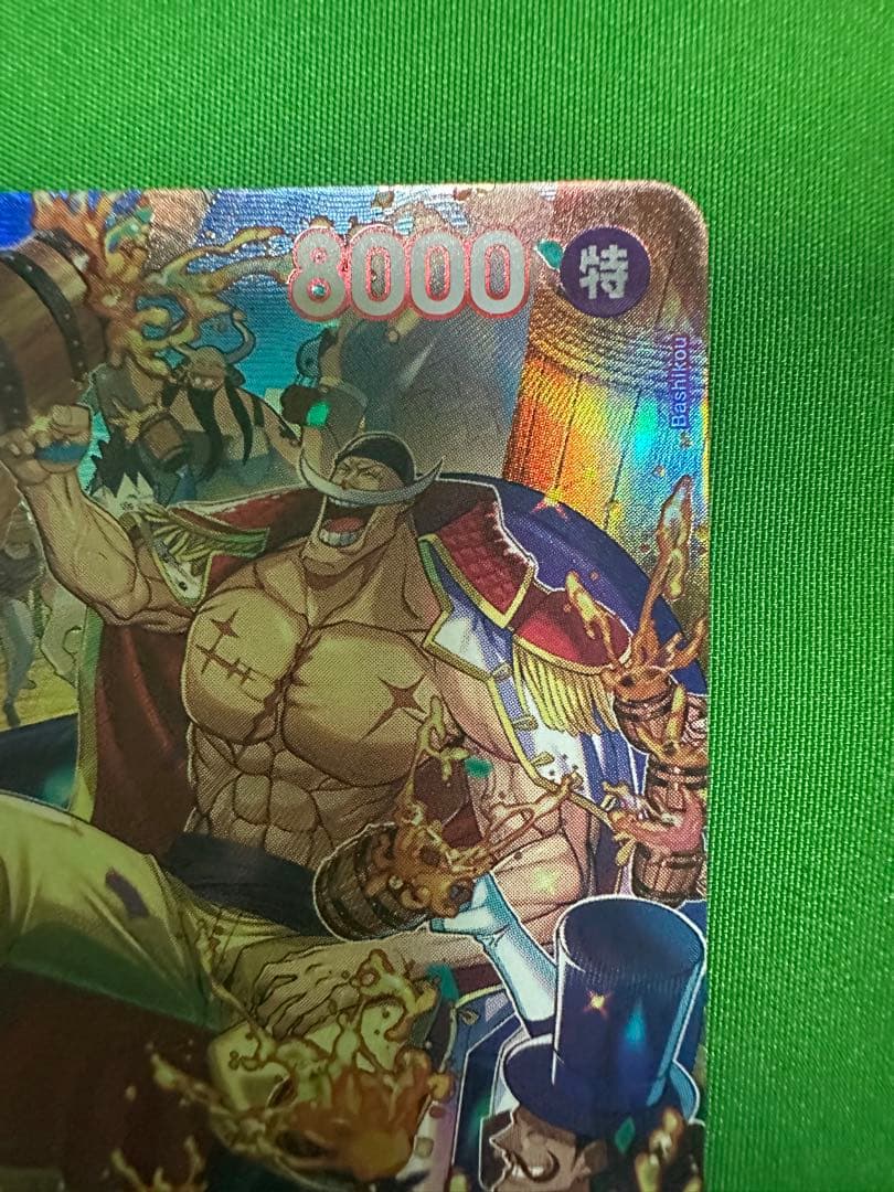 One Piece Edward Newgate SP Card model ST15-002 in a protective sleeve and waterproof hard case