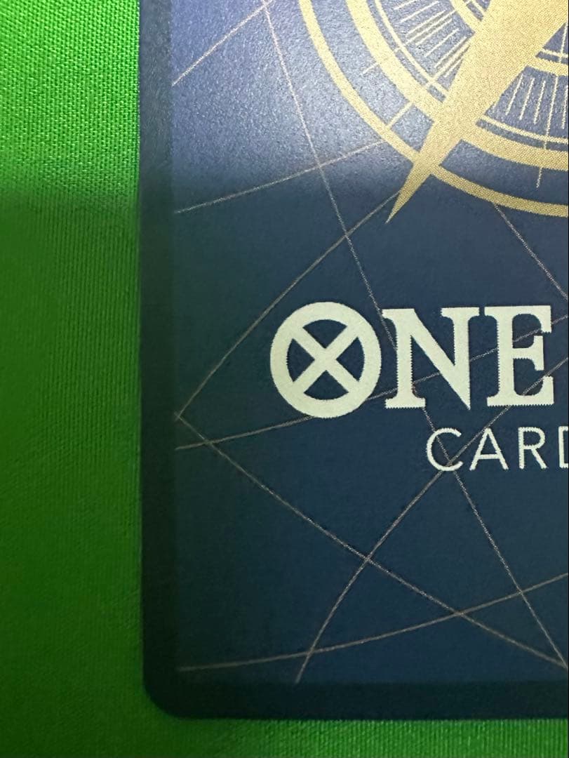 One Piece Edward Newgate SP Card model ST15-002 in a protective sleeve and waterproof hard case