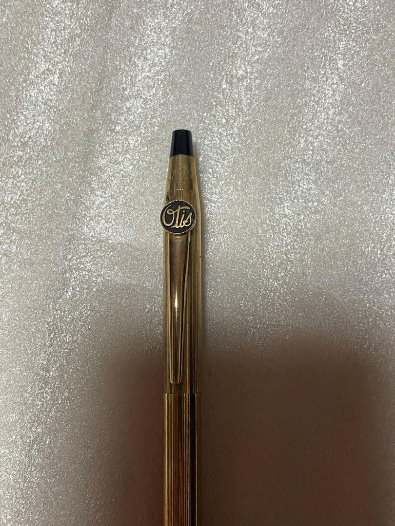 CROSS brand gold ballpoint pen with sleek design, imported from Japan
