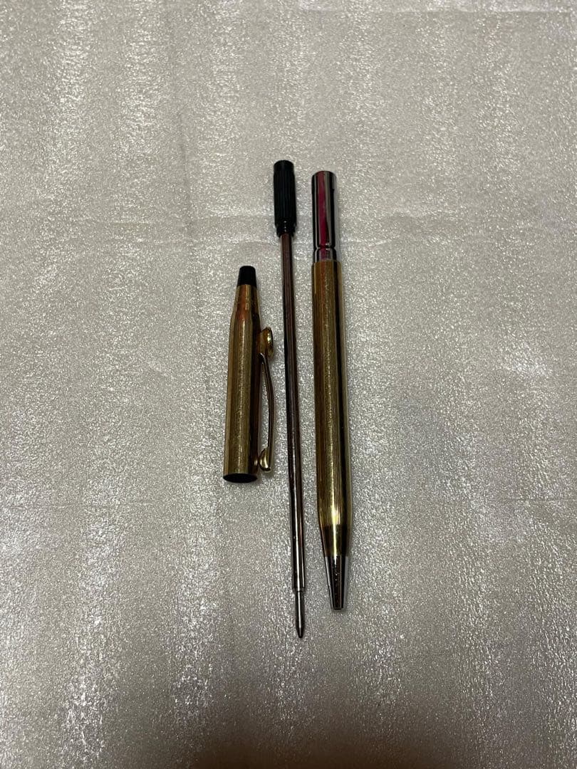 CROSS brand gold ballpoint pen with sleek design, imported from Japan